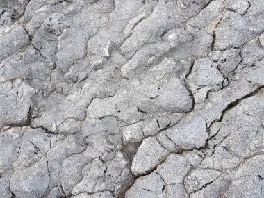 Güneşli bir günde sert kayalar. Kaya dokusu. Rocky arkaplanı