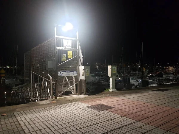 Access door to sport port at night