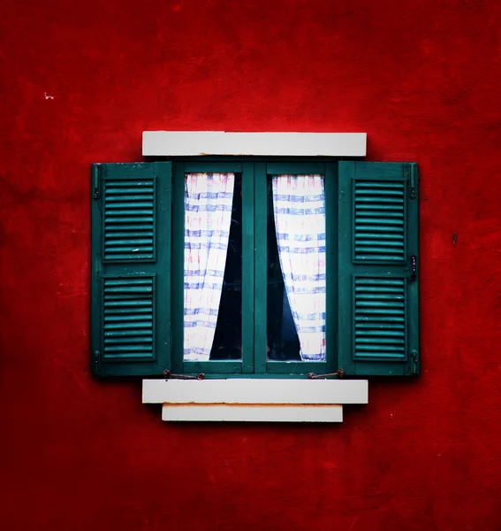 Vintage window on red cement wall — Stock Photo, Image