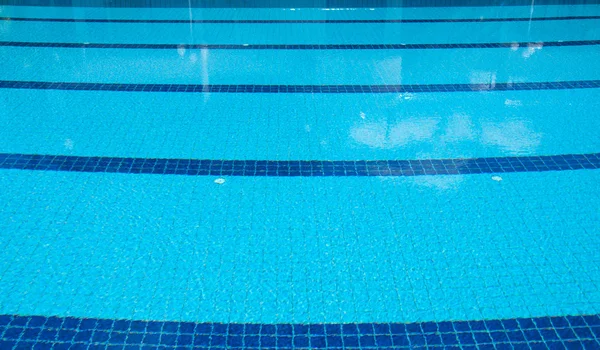 Blue swimming pool at sport center — Stock Photo, Image