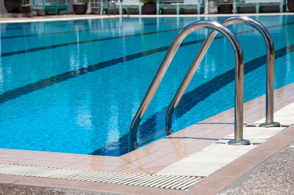 Swimming pool with stair at sport center Stock Picture