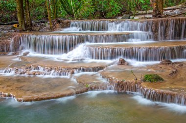 Waterfall in deep rain forest jungle (Huay Mae Kamin Waterfall clipart