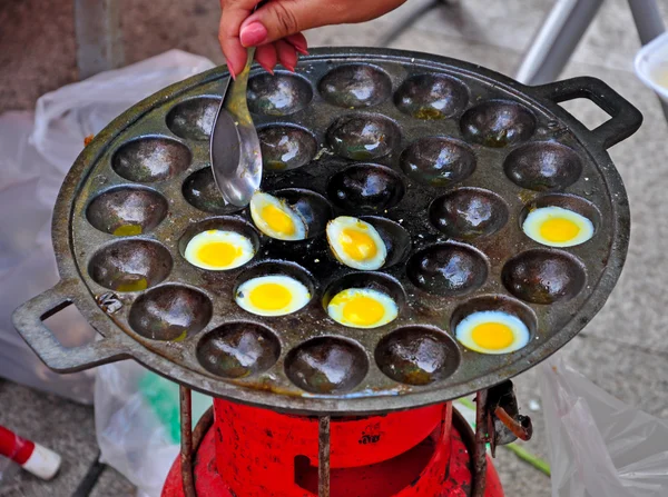 Fried quail egg in Pan hole thai style — Stock Photo, Image