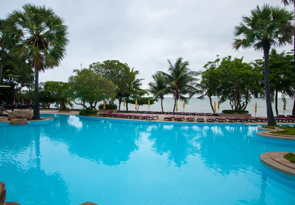 Blue swimming pool in hotel — Stock Photo, Image