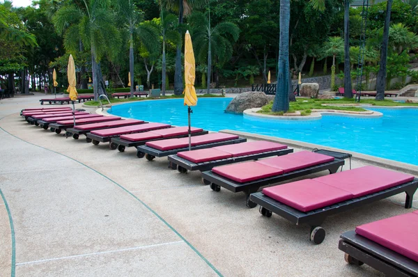 Blue swimming pool in hotel — Stock Photo, Image