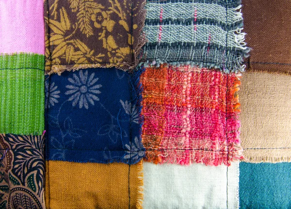 Текстура різних барвистих тканин — стокове фото