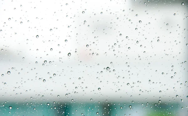 Goccia d'acqua su vetro e gocciolamento — Foto Stock