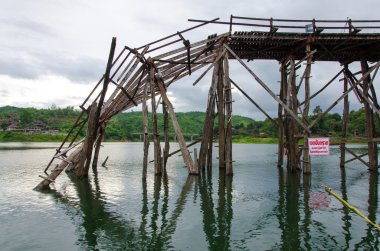 Longest wooden bridge it broken in Thailand clipart