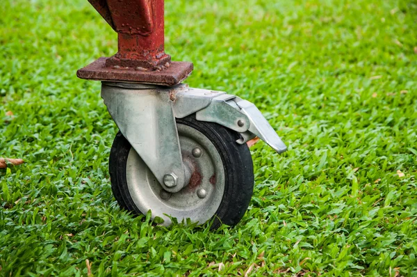 Wheelbarrow in the garden — Stock Photo, Image