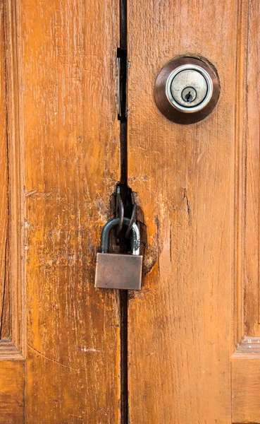 Master key on wood door and key knob — Stock Photo, Image