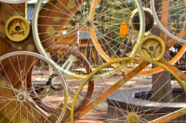 Bicycle wheels pattern decorate to background. — Stock Photo, Image