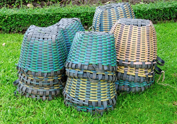 Plastic basket on a green grass in park — Stock Photo, Image