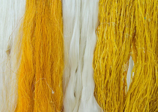 Raw silk thread for background — Stock Photo, Image