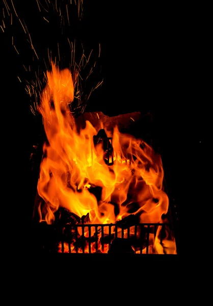 Fire in fireplace black background — Stock Photo, Image