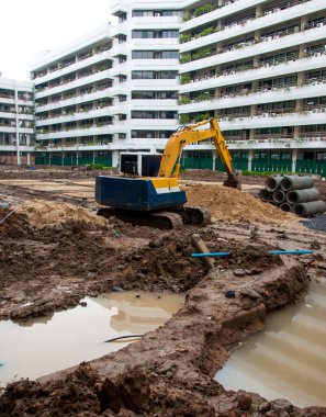 Ekskavatör inşaat ekipman Parkı'nda şantiye