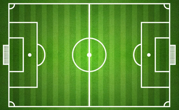 Yukarıdan gelen yeşil futbol sahası.