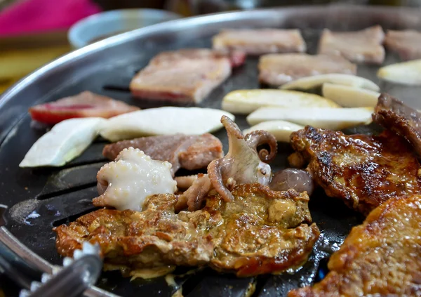 Korean barbecue - meat are being cooked on stove — Stock Photo, Image