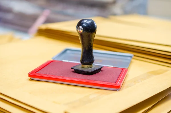 Stempelkussen en houten rubber stempel — Stockfoto