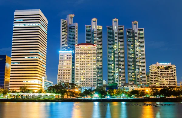 City downtown at night with building reflection in the river Ban — Stock Photo, Image