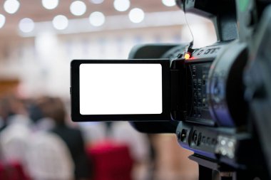 İş konferans odasındaki video kamera katılımcıları ve konuşmacıları kaydediyor, seminer toplantısı, etkinlik ve seminer konsepti.