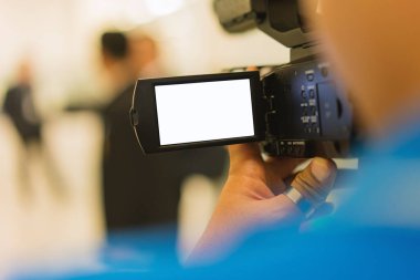 İş konferans odasındaki video kamera katılımcıları ve konuşmacıları kaydediyor, seminer toplantısı, etkinlik ve seminer konsepti