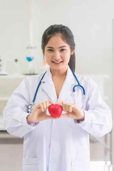 Female Doctor Stethoscope Holding Red Heart Hospital Office Medical Health — ストック写真