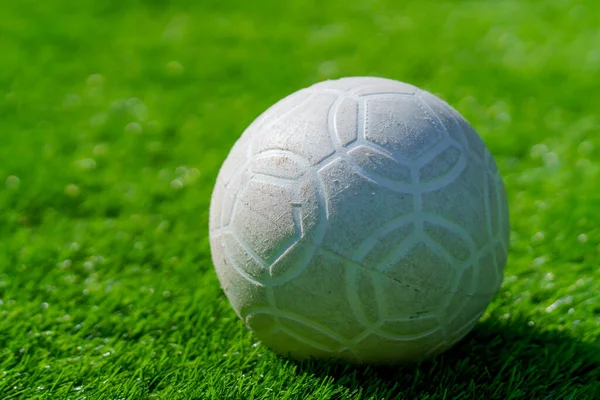 Plastic Football Ball Green Grass Artificial Lawn Background — 스톡 사진