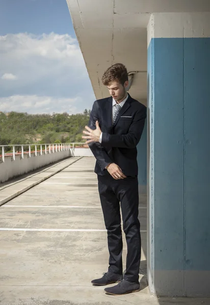 Business man cleaning the suite — Stock Photo, Image