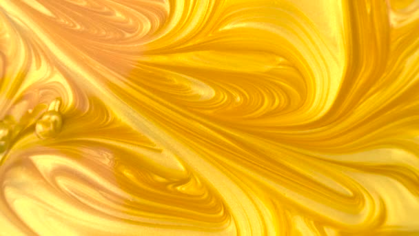 黄金のインクの液体マクロショットのドロップ — ストック動画