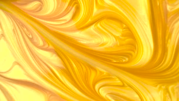 Satisfazendo macro luxo líquido de tinta dourada — Vídeo de Stock