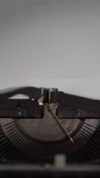 Written Charles Dickens on a white paper with vintage typewriter — Stock Video