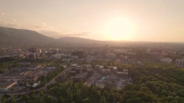 Aerial panorama at sunset over Sofia city, Bulgaria. Aerial drone view- Skyline of Sofia, Bulgaria at sunset from City Park