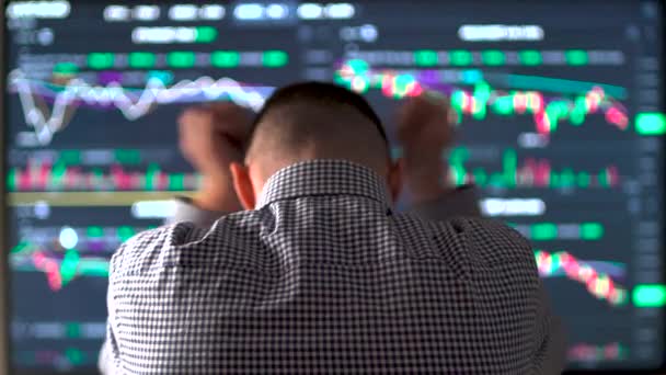 Rear View Frustrated Stock Trader Looking Financial Graphs Crypto Currency — Stock Video