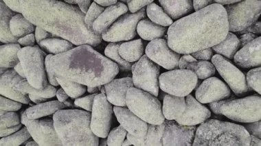  flying up drone reveal stone background fine texture. High quality 4k footage