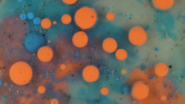 Πορτοκαλί Και Teal Μελάνι Περιστρεφόμενη Μακροεντολή Πλωτή Υφή Φόντου Επιστήμη — Αρχείο Βίντεο