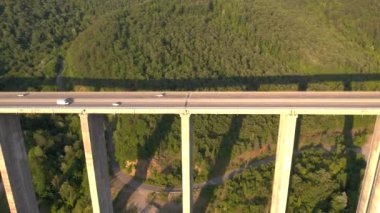 Panorama landscape of highway road between mountains at sunny day. Transportation scene. Freeway road aerial view. Brazilian road landmark. Sea mountain. High quality 4k footage