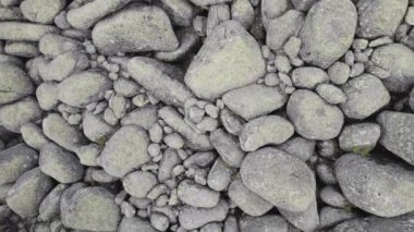 Rock textures. Rocks seamless natural texture. Flying up drone reveal stone background fine texture. High quality 4k footage
