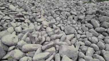 Rock textures. Rocks seamless natural texture. Flying up drone reveal stone background fine texture. High quality 4k footage