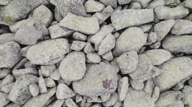 Rock textures. Rocks seamless natural texture. Flying up drone reveal stone background fine texture. High quality 4k footage