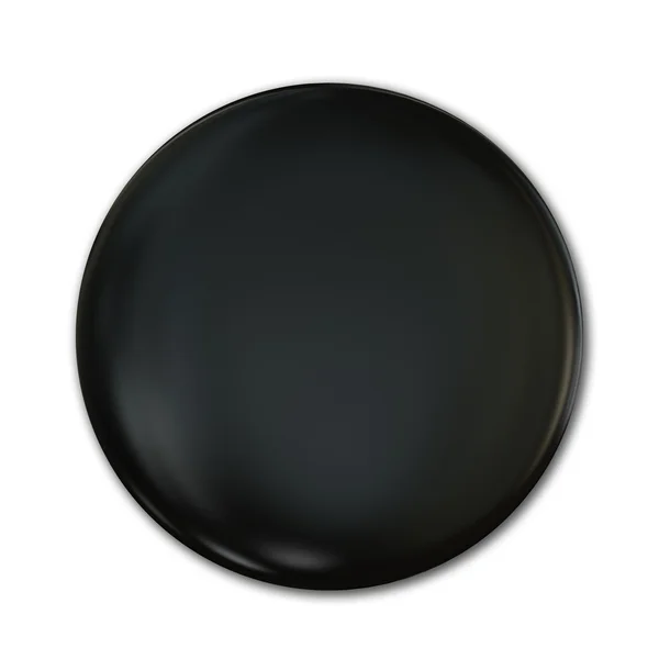 Insignia de plástico negro aislada sobre fondo blanco — Foto de Stock