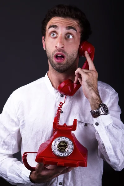 En förvånad telephoneman — Stockfoto