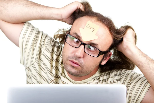 Freaky-crazy-man-med-laptop — Stockfoto