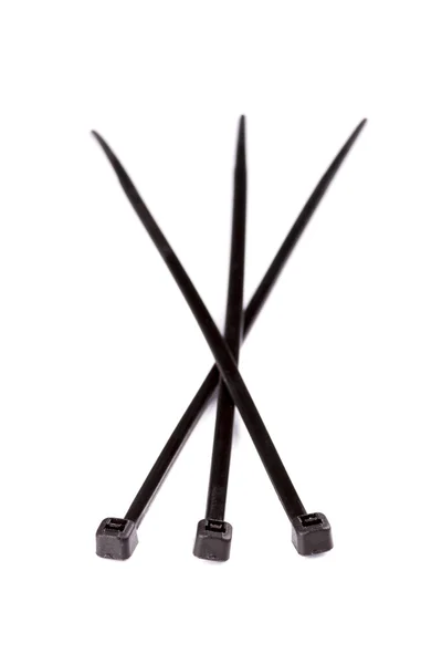 Three-Black-cable-ties — Stock Photo, Image