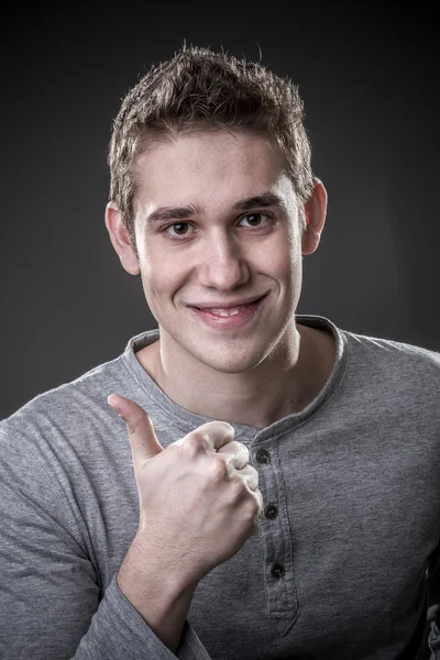 Portrait boy thumbs up — Stock Photo, Image