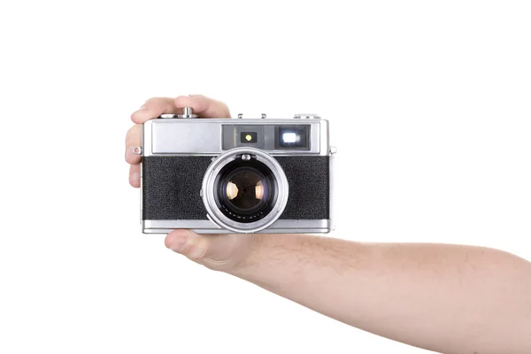 Menselijke hand bedrijf camera — Stockfoto