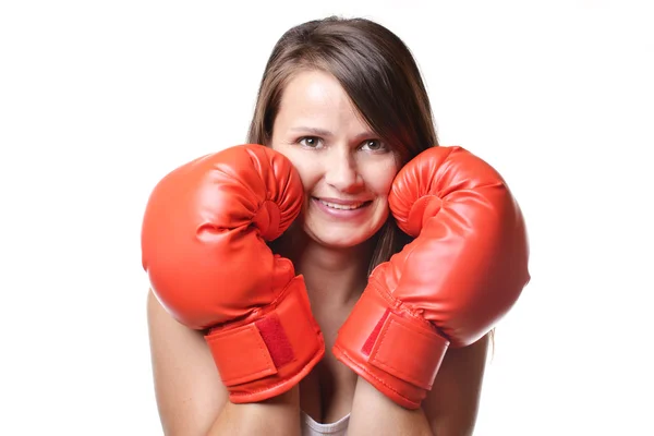 Beautiful smiling woman with the red boxing gloves — Stock Photo, Image