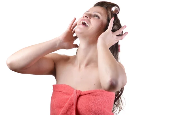 Fille drôle avec des bigoudis de cheveux sur sa tête — Photo