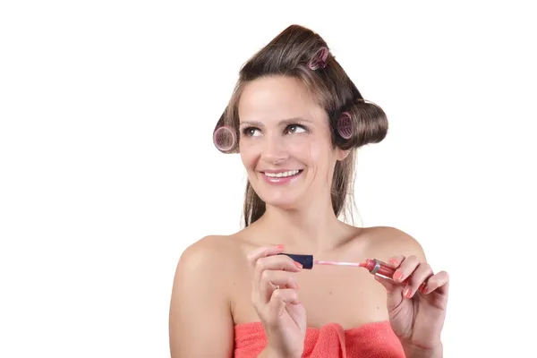 Funny girl with hair curlers on her head — Stock Photo, Image