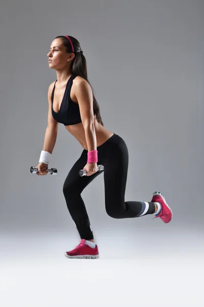 Mooie fitness vrouw uit te werken — Stockfoto