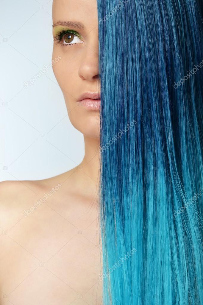 Young beautiful woman with blue hair